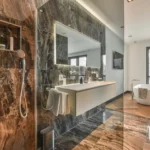Natural stone spacious dark bathroom design instirations Toronto