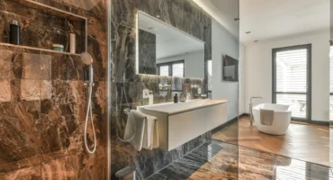 Natural stone spacious dark bathroom design instirations Toronto